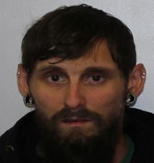 A person with a beard

AI-generated content may be incorrect.